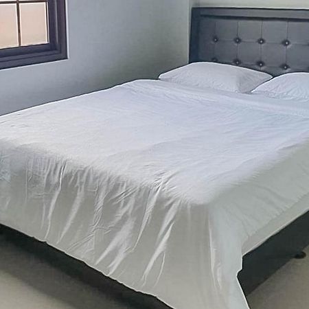 Mahkota Residence Mitra Reddoorz كراوانغ المظهر الخارجي الصورة