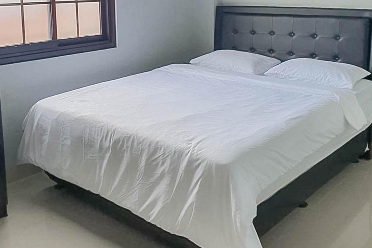 Mahkota Residence Mitra Reddoorz كراوانغ المظهر الخارجي الصورة
